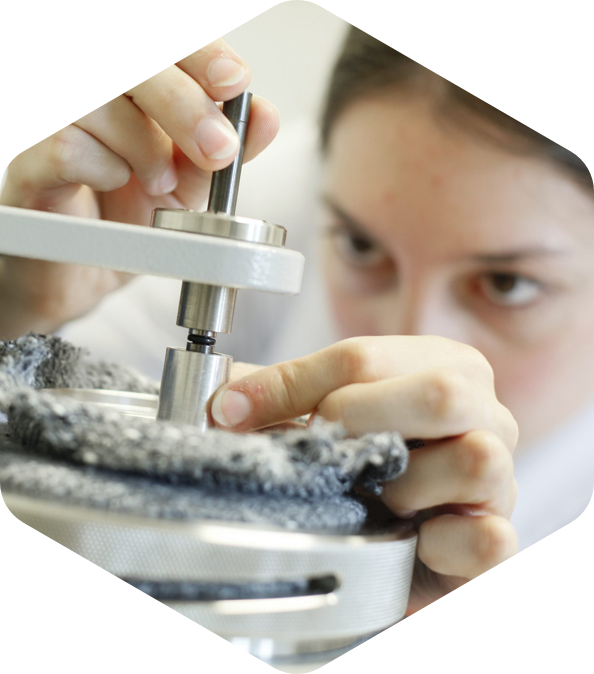 Woman checks material in test bench
